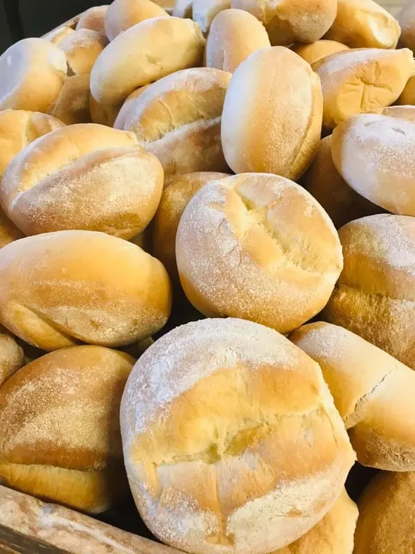 Fresh Portuguese rolls in a basket