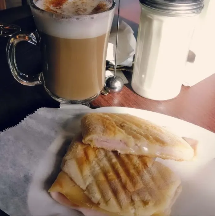 Pressed panini with a latte